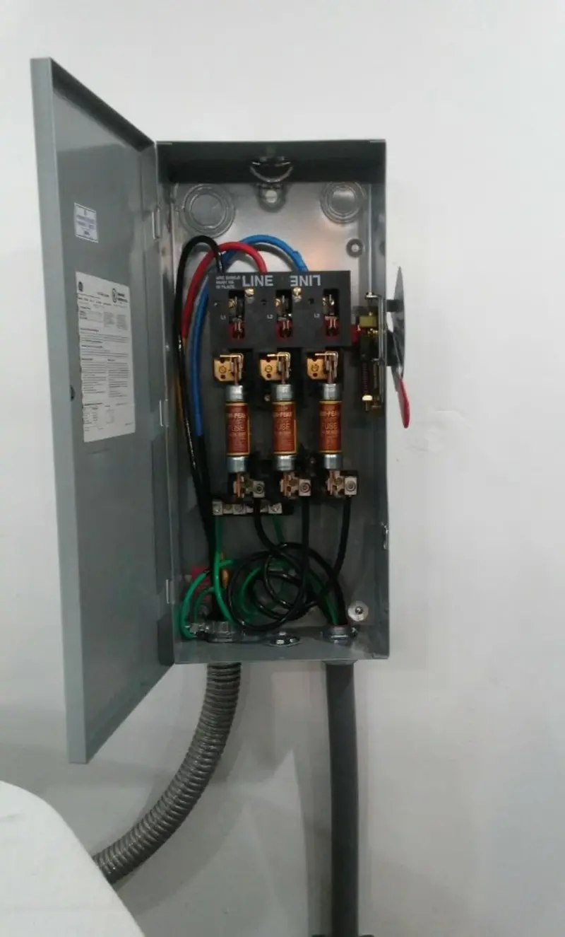 Three-phase disconnect switch installed for Smoke Detector Installation in Scott AFB